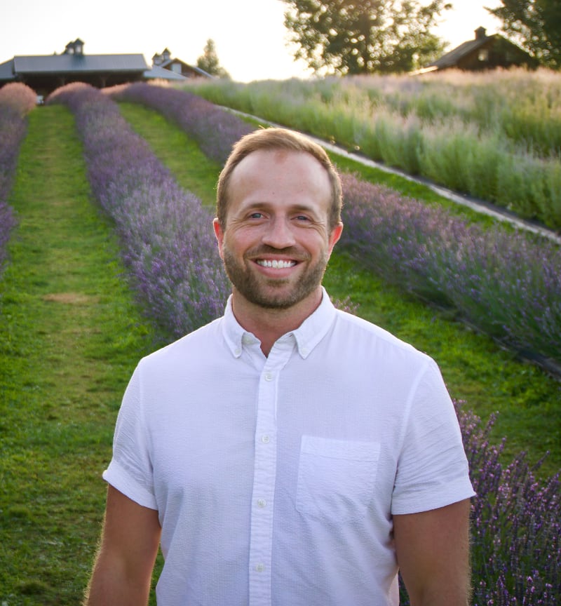 Profile picture of Thomas Posen standing in a lavender field